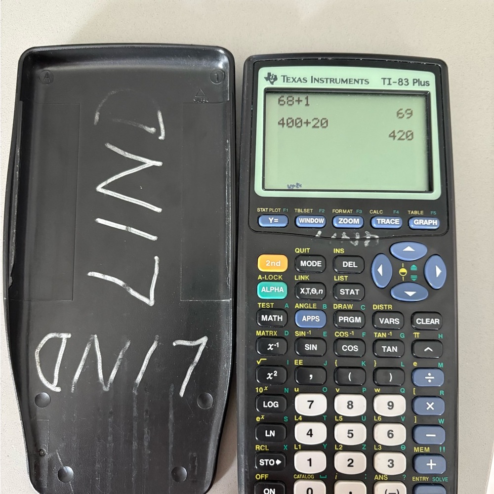 Texas Instruments TI-83 Plus Graphing Calculator - Black and Blue